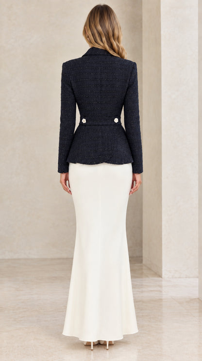 Back view of Navy Blue tweed peplum jacket showing clean tailoring