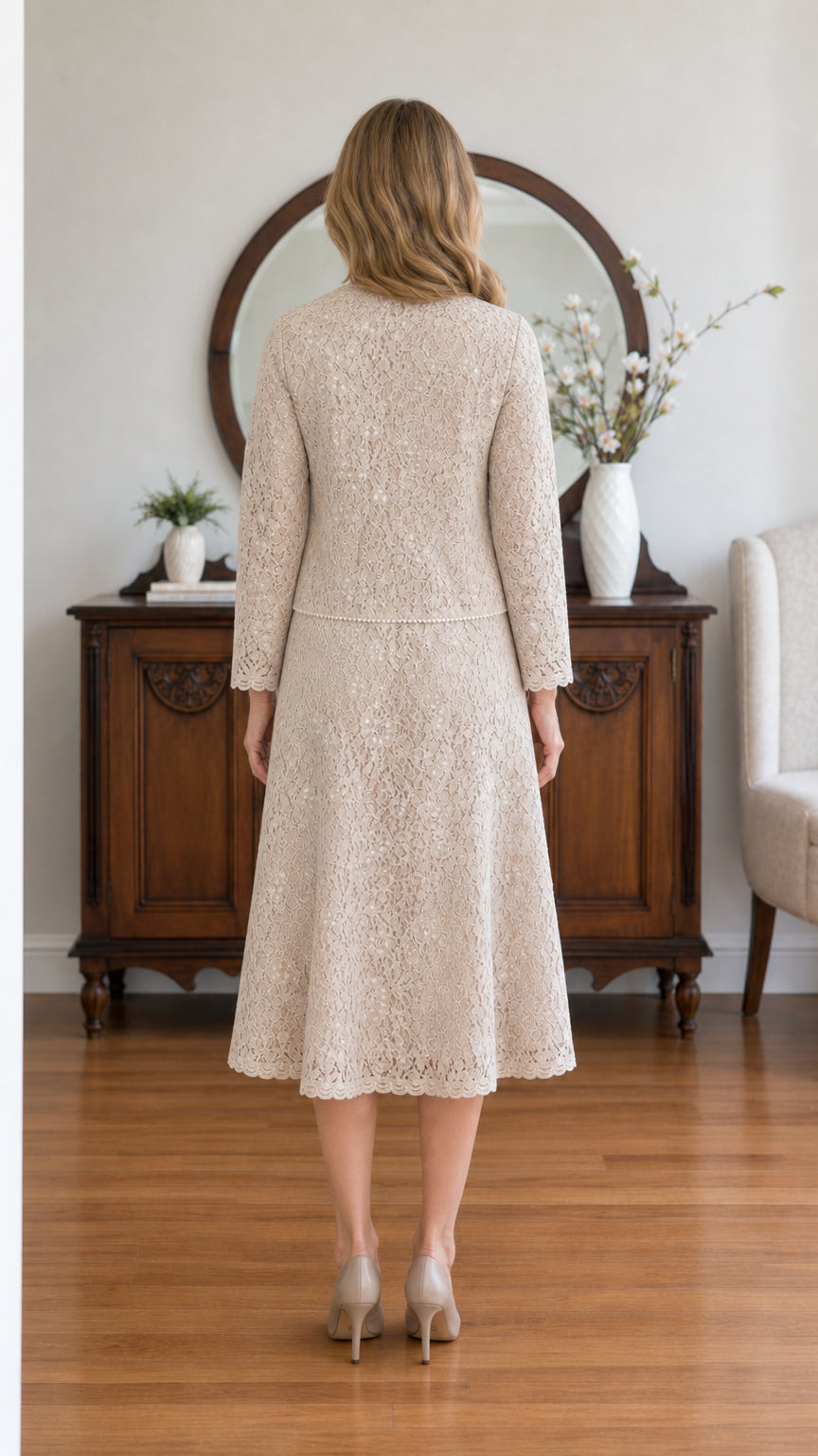 Back view of model wearing Champagne Beige A-line lace dress with matching jacket