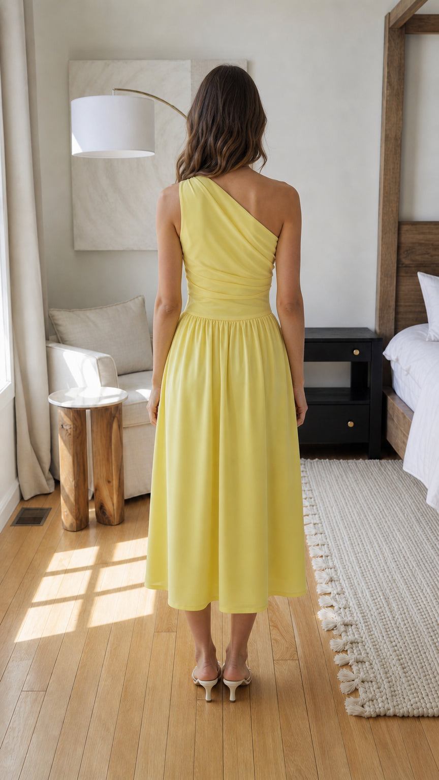 Back view of yellow one-shoulder midi dress