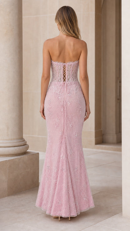 Back view showing lace-up detail of pink formal dress