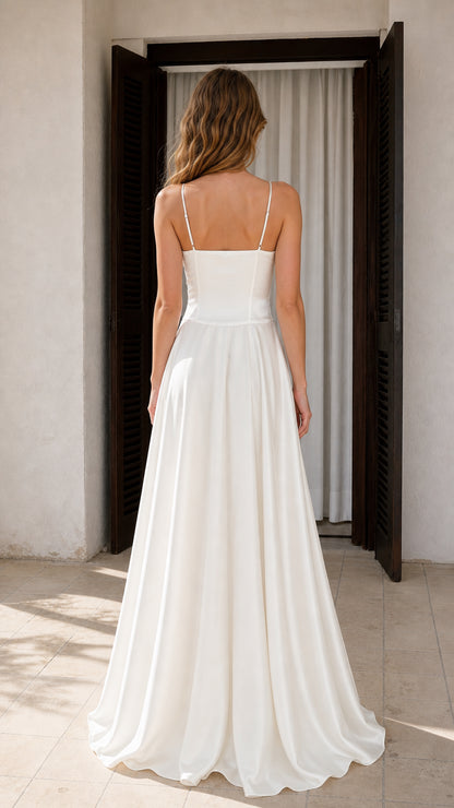 Back view of Ivory satin spaghetti strap maxi dress showing drape