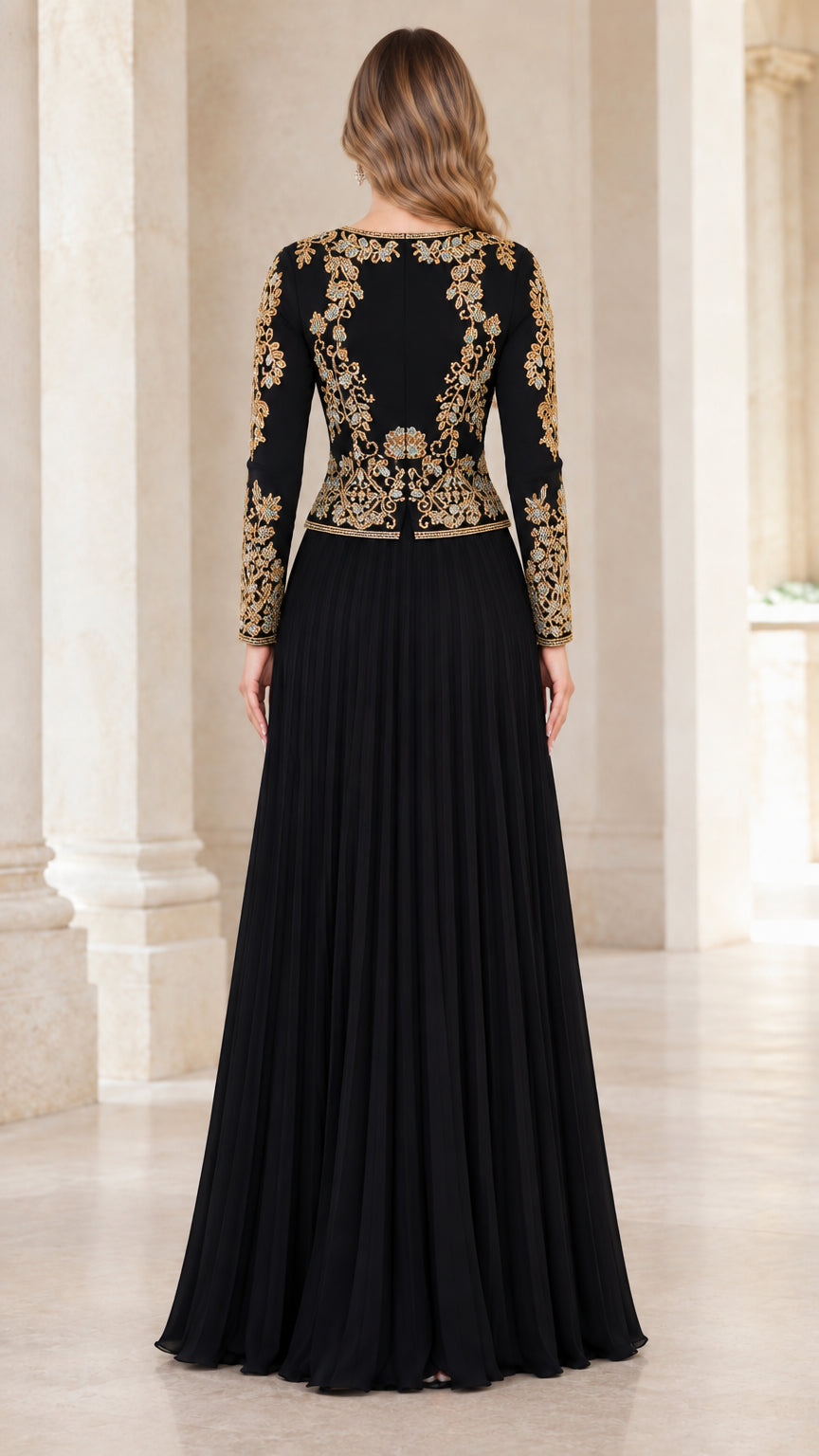 Back view of black long sleeve evening gown featuring gold scroll embroidery