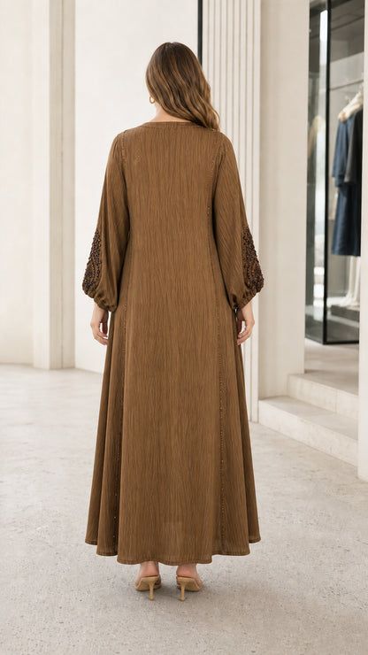 Back view of woman wearing brown full-length modest kaftan dress