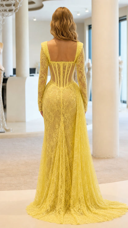 Back view of yellow lace evening gown showing train and corset back