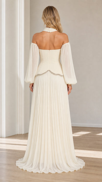 Back view of model in ivory choker off-the-shoulder pleated evening gown