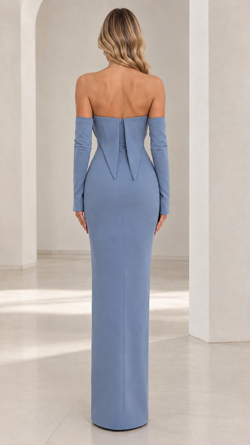 Back view of dusty blue strapless formal column gown showing structured back detail