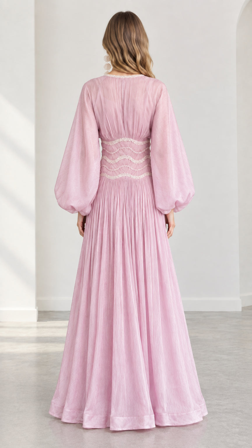 Back view of model in pink pleated balloon sleeve maxi dress