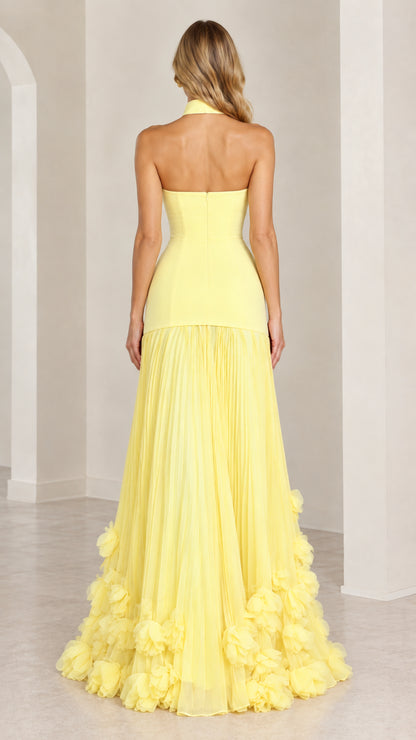 Back view of the yellow formal dress showing fitted bodice and back zip