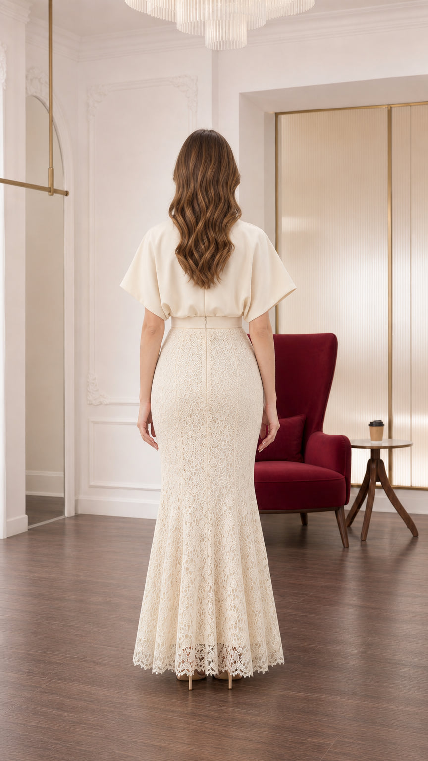 Full back view of cream draped evening maxi dress with flutter sleeves