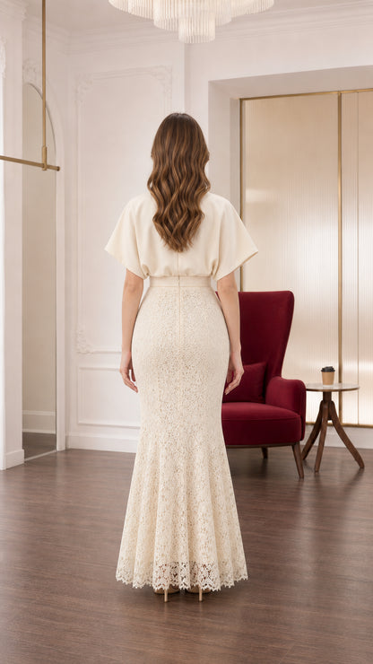Full back view of cream draped evening maxi dress with flutter sleeves