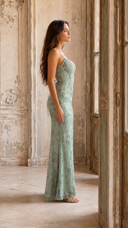 Side view of sage floral embroidered mermaid evening gown