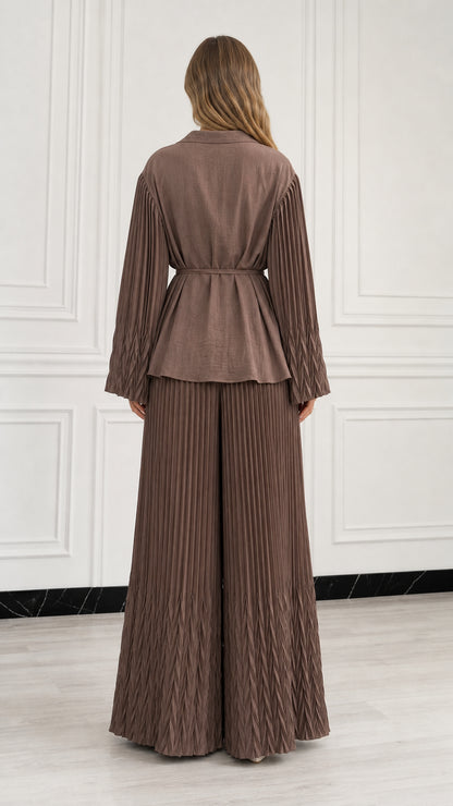 Back view of woman wearing Mocha Brown belted pleated top and wide leg trousers