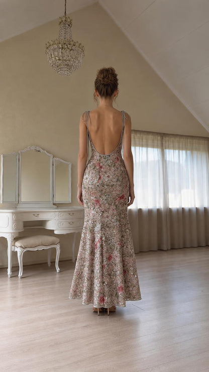Back view of model showing open back and tie straps