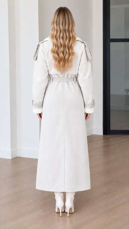 Back view of model in an off-white full-length belted trench coat