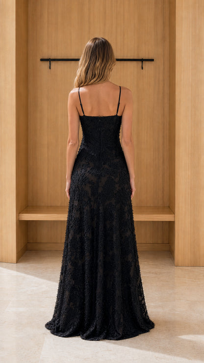 Back view of model wearing black lace maxi dress