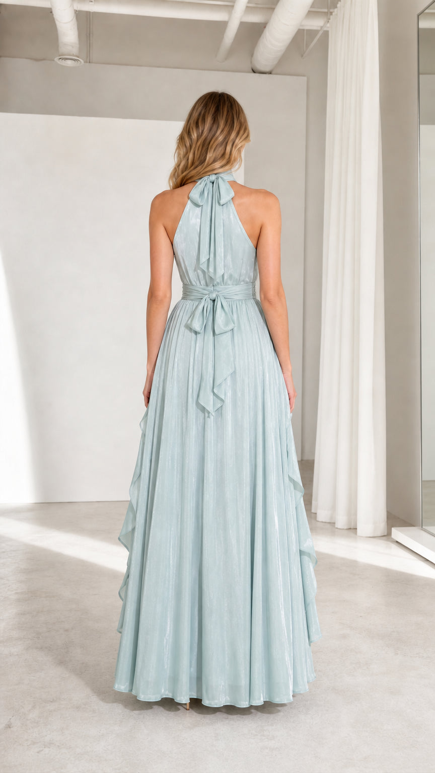 Back view of model showing halter neck tie and pleated back of sage green dress