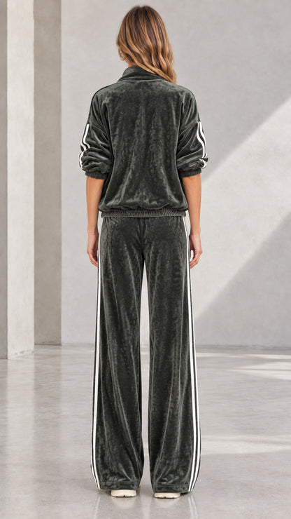 Back view of woman wearing Dark Green velvet tracksuit with wide-leg cut
