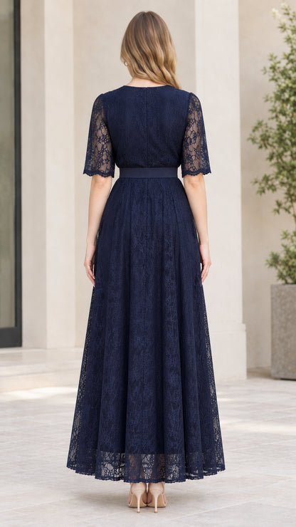Back view of navy blue floral lace maxi dress showing coverage and drape