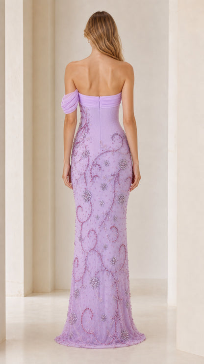 Back view of model in lilac formal evening gown