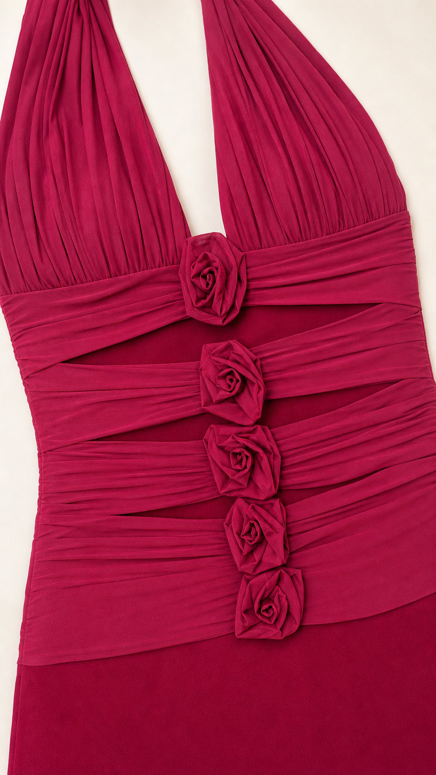 Close-up of the front bodice with rosette and cutout details on Fuchsia dress