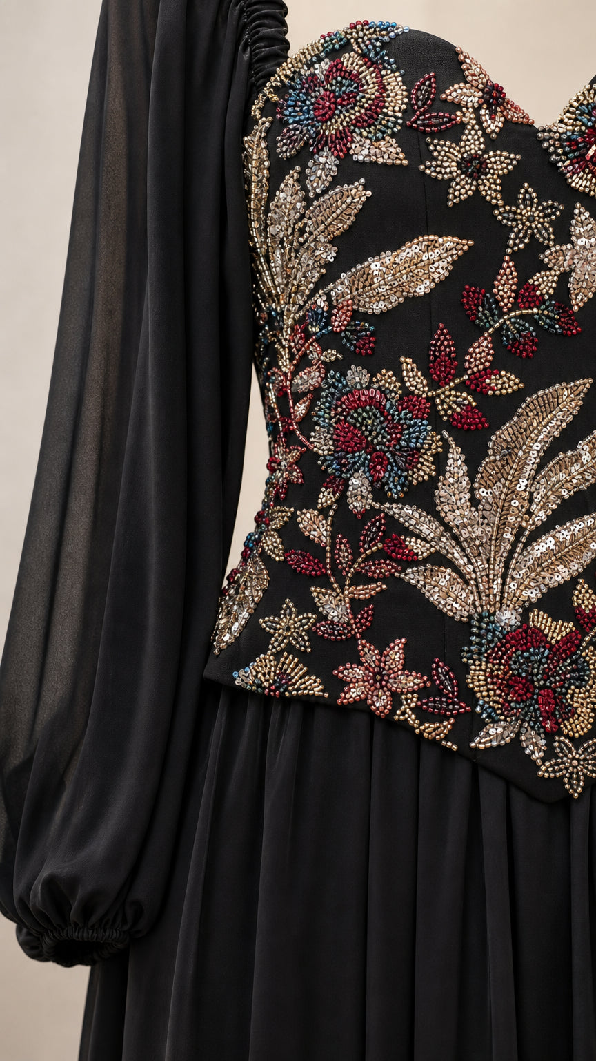 Close-up detail of intricate floral beading and embroidery on the corset bodice