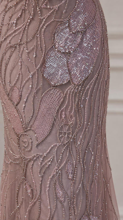 Close-up of intricate sequin and bead embroidery on gown