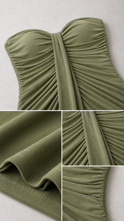 Close-up detail of gathered ruched bodice and fabric texture in olive green
