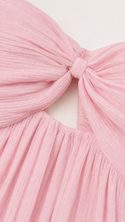 Close-up of the pink textured twist detail and gathered fabric
