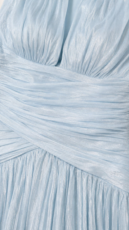 Close-up of fabric texture and pleated waist detail