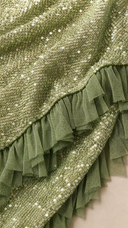 Close-up detail of green sequins and mesh ruffle trim
