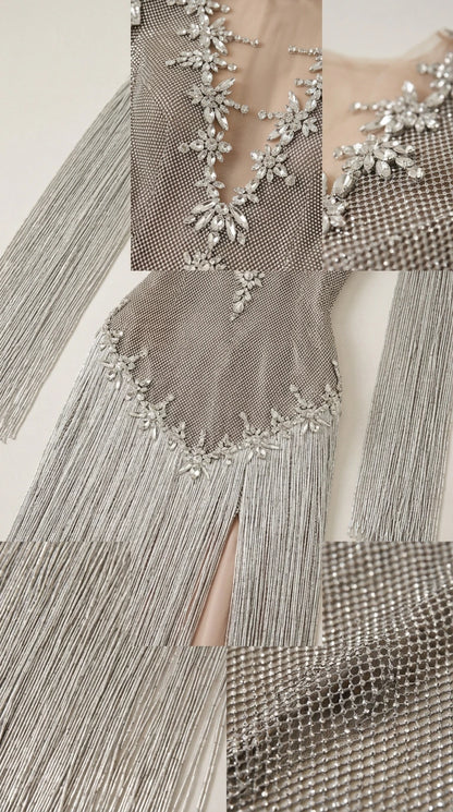 Close-up detail of rhinestone crystal neckline appliques and textured mesh fabric