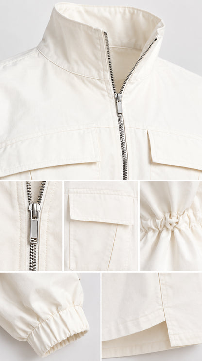 Close-up details of collar, zipper, flap pockets, and waist drawstring