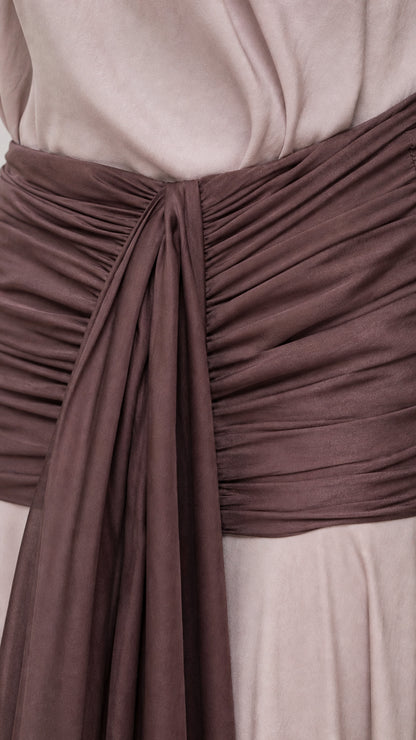 Close-up of ruched waistband and drape detail
