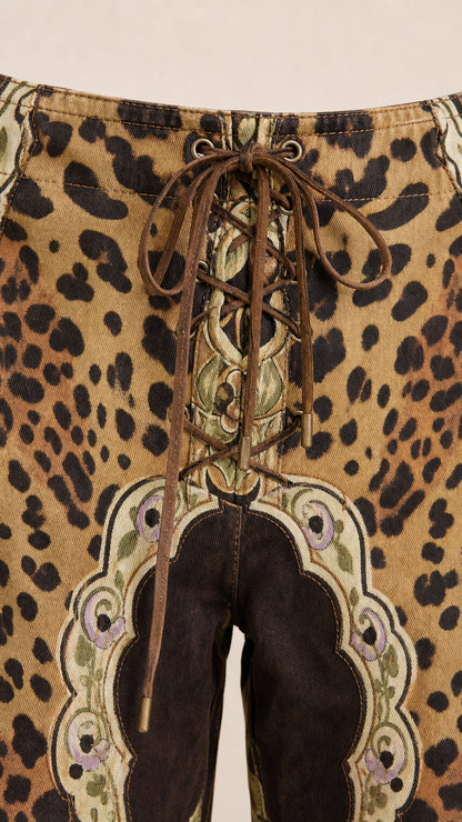 Close-up detail of the front lace-up closure and baroque leopard print waistband