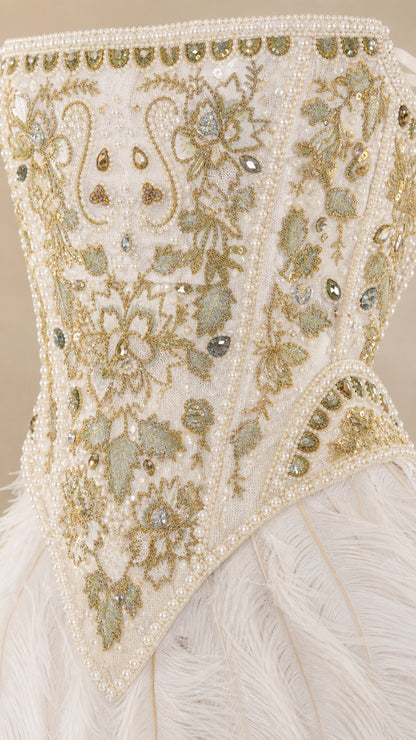 Close up detail of intricate bead embroidery on dress