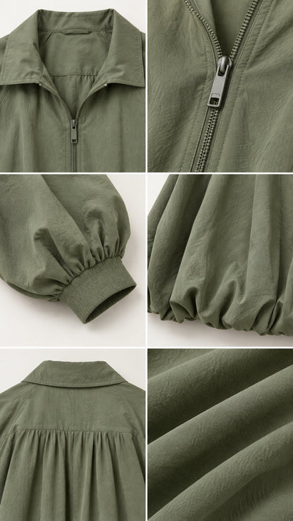 Close-up details of olive green bubble jacket showing collar, zipper, cuffs, and textured fabric