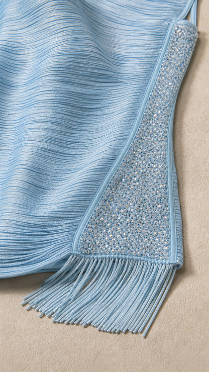 Close-up detail of rhinestone side trim and fringe hem
