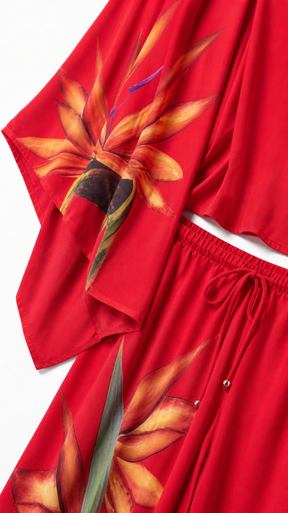 Close-up detail of the floral print sleeve and drawstring waistband
