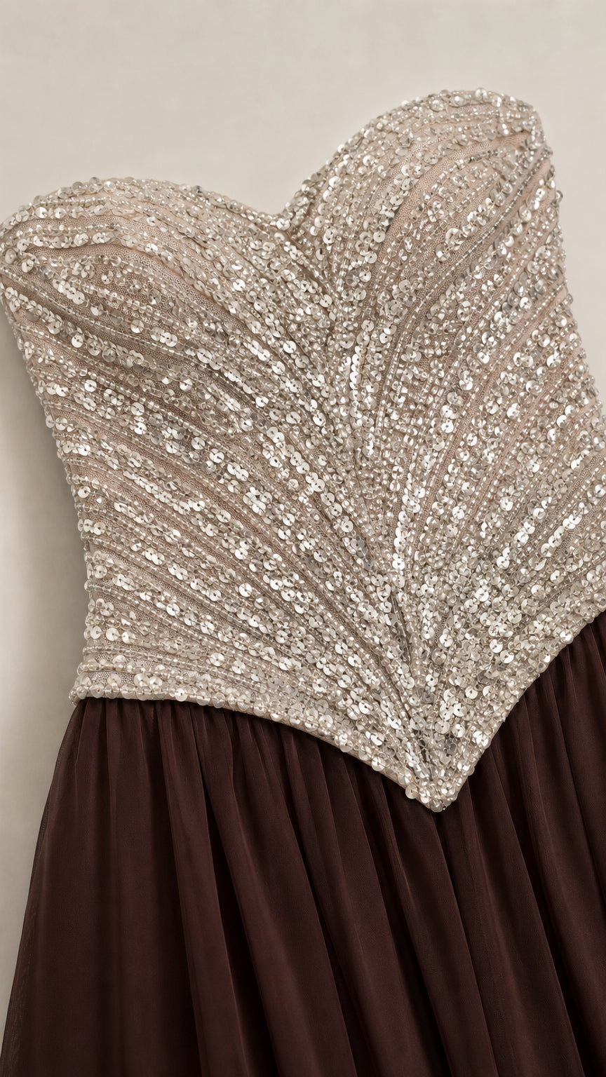 Close-up detail of silver sequin chevron pattern on sweetheart basque bodice