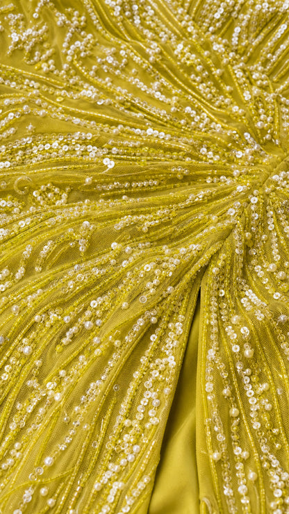 Close-up detail of radiant beadwork and sequin embroidery on Lime Green fabric