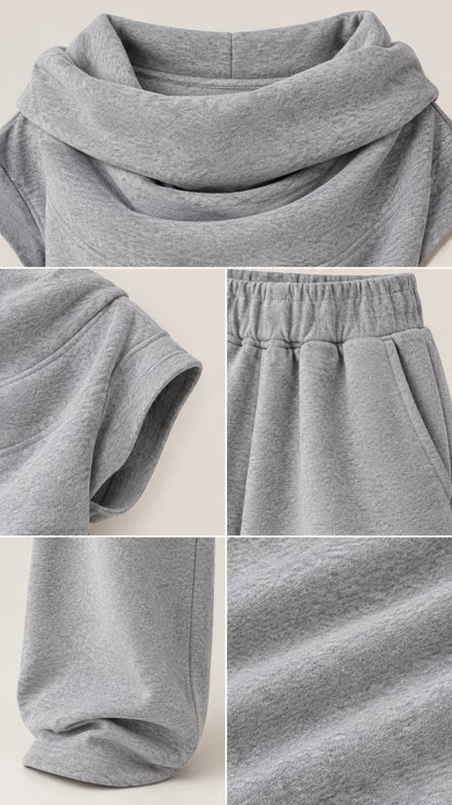 Close-up details of cowl neckline, sleeve cuff, gathered elastic waistband with pockets, and soft fleece texture