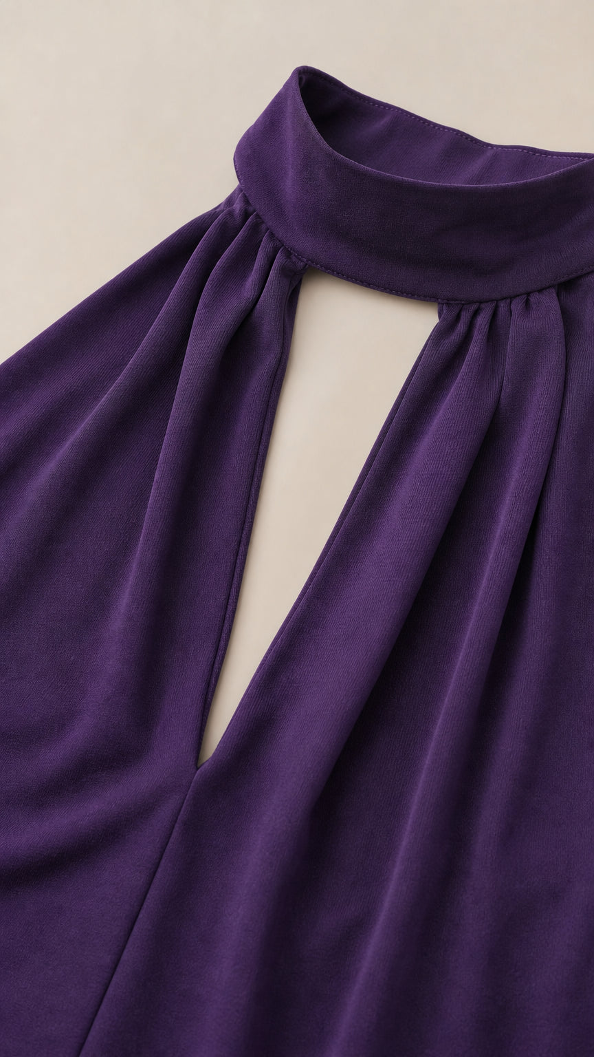 Close-up detail of purple choker collar and front keyhole cutout