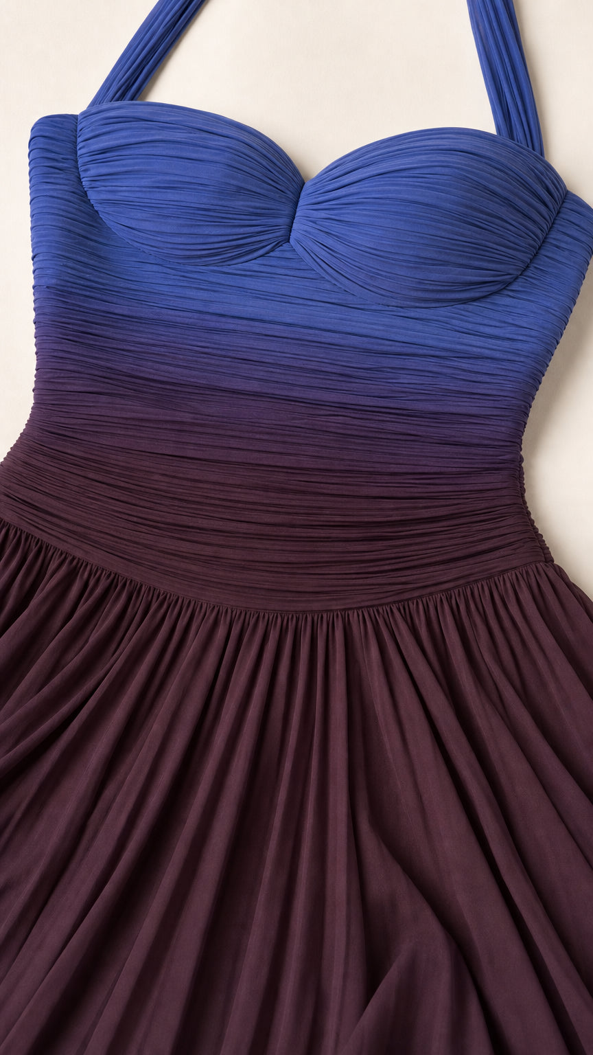 Close-up of ruched sweetheart bodice and blue ombre gradient
