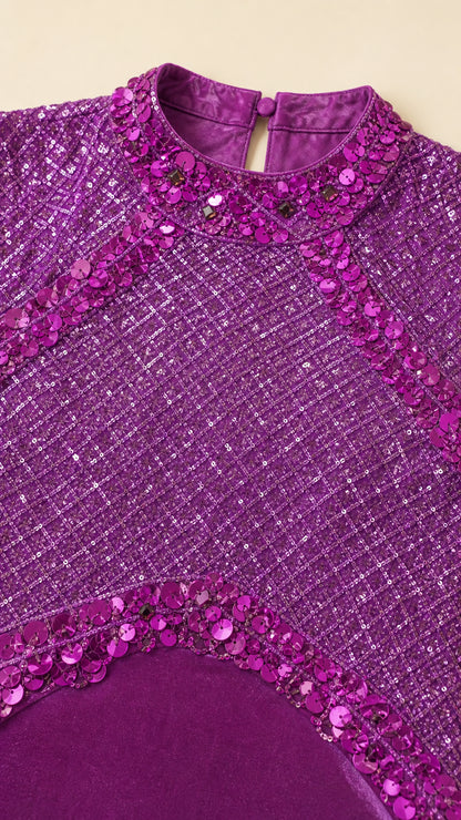 Close-up of sequin high neckline and bodice detailing