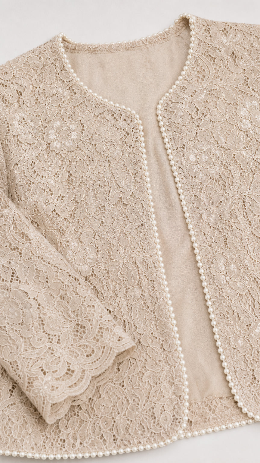 Close-up detail of Champagne Beige lace jacket showing scalloped cuffs and pearl beaded trim