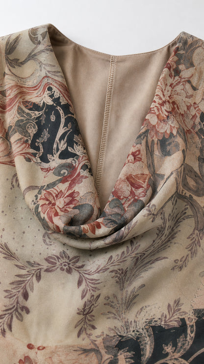 Close up of cowl neckline and floral print detail