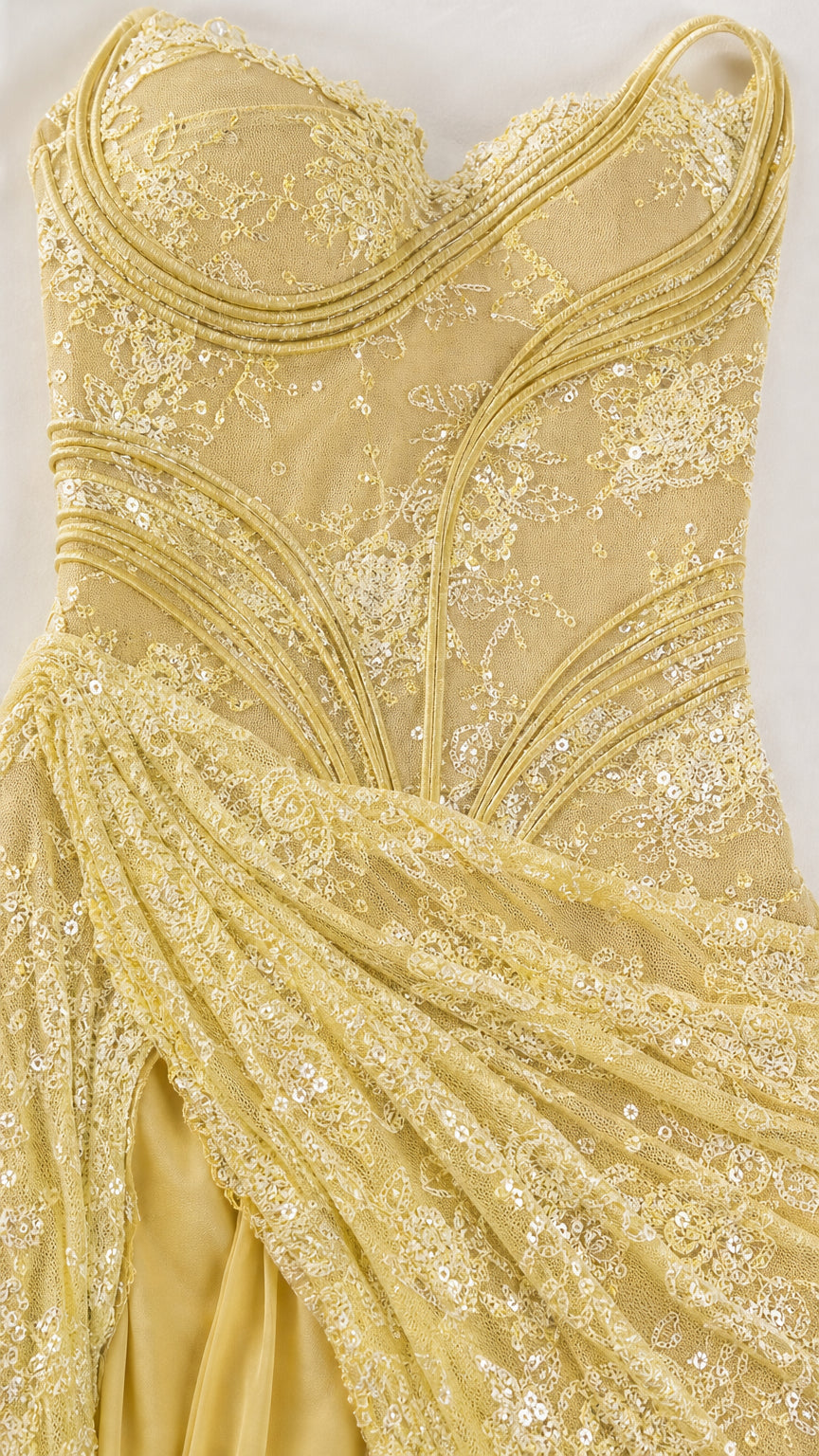 Close up of yellow sequin lace corset bodice detail