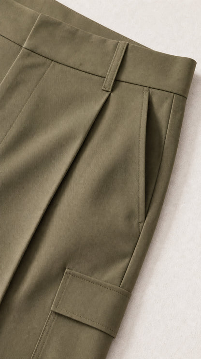 Close-up detail of trousers showing waistband, front pleats, and side cargo flap pocket