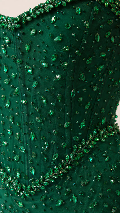 Close-up detail of green beadwork and embellishments