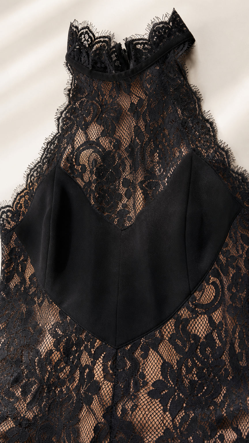 Close-up of lace bodice and halter neckline detail